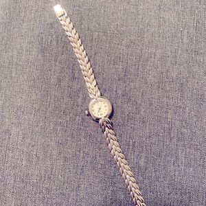 A band new stainless steel watch